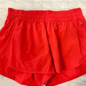 Lululemon tracker low rise lined shorts. 4” Red